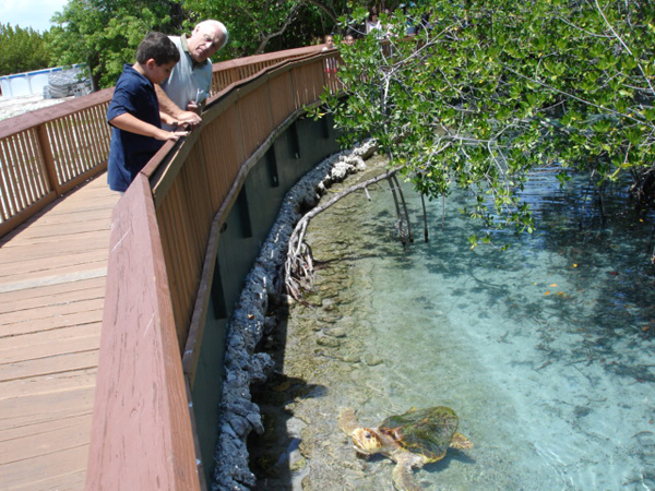 Lee Duquette and his grandson at the turtle pond
