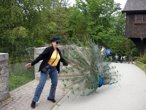 Karen Duquette and a peacock