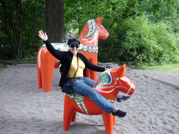 Karen Duquette on a Dala horse