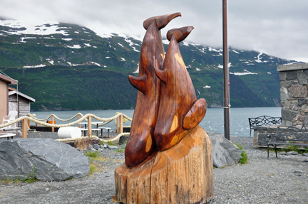 carved wooden dolphins