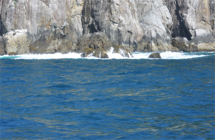 waves breaking on the rocks