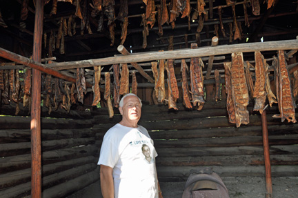 Lee Duquette by the salmon smokehouse