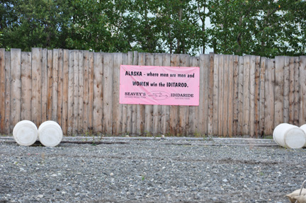 sign - Alaska where men are men and women with the Iditarod