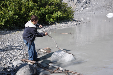 Alex playing with a chunk of ice
