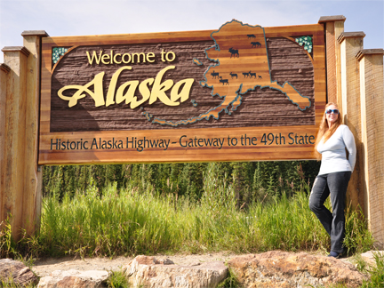 welcome to Alaska sign and Karen Duquette