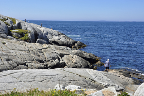 Lee Duquette checks out the waves in the Atlantic Ocean