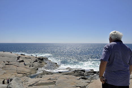 Lee Duquette checks out the waves in the Atlantic Ocean