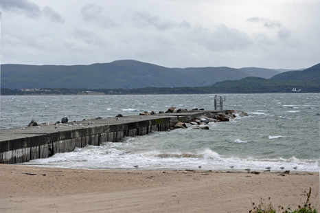 a dock with waves