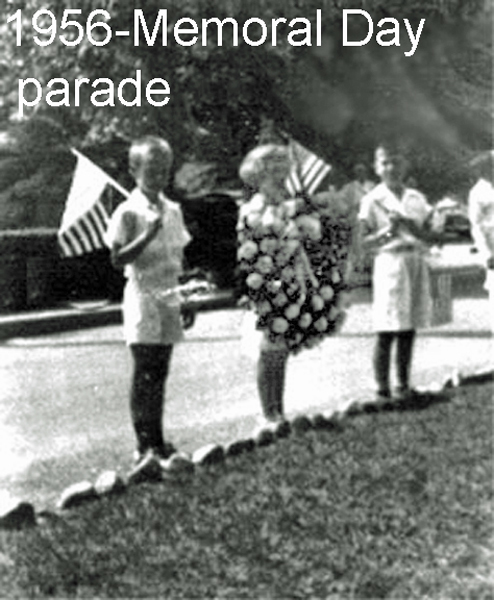 Karen carrying the wreath in Memorial Day Parade