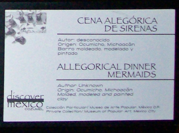 molded, modeled and painted clay sign