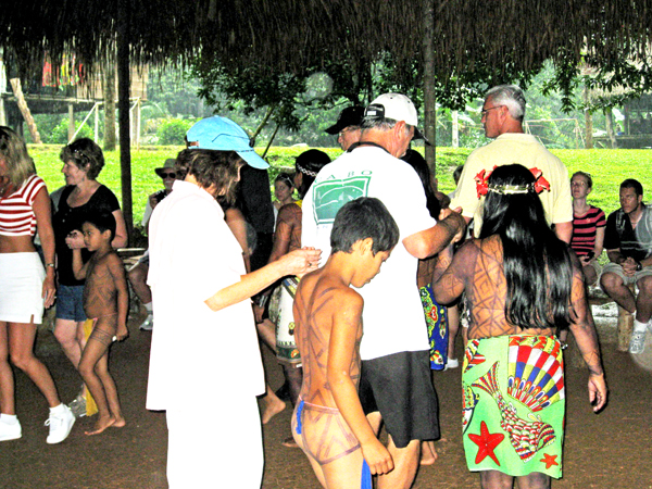 The native dancers and tourists