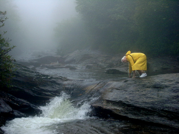 Lee Duquette bent down to feel the temperature of the water