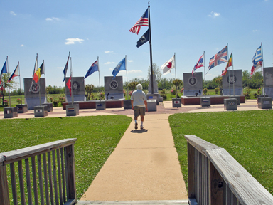 Lee walking towards the memorial