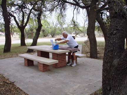 Lee Duquette setting up a picnic