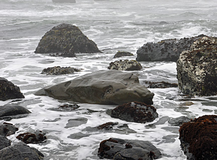 waves crashing over the rocks