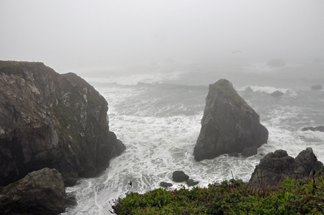 the ocean pounding the rocks