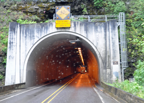 entrance to tunnel through a rain speckled window