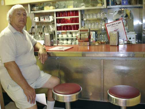 Lee at the counter in the diner