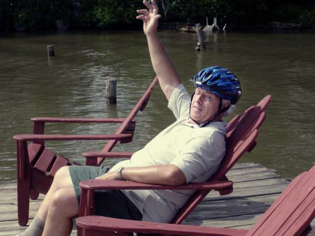 Lee on the dock by the river and beach area